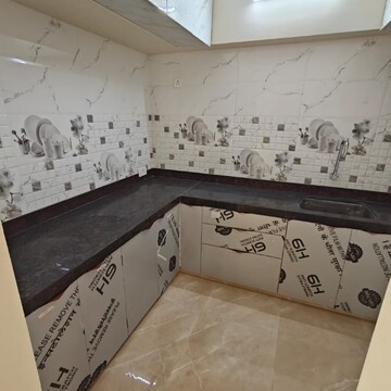 Kitchen in 2 BHK Apartment at Triumph Omkareshwar CHS, Food Corporation Of India Warehouse – for Rent