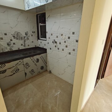 Kitchen in 2 BHK Apartment at Triumph Omkareshwar CHS, Food Corporation Of India Warehouse – for Rent