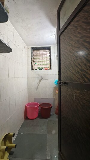 Bathroom in 1 BHK Apartment at Devta CHS, Kharigaon – for Rent