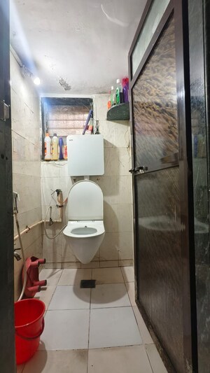 Bathroom in 1 BHK Apartment at Devta CHS, Kharigaon – for Rent
