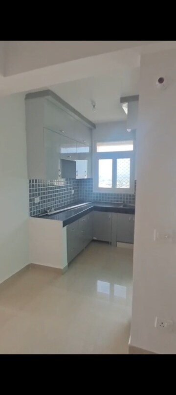 Kitchen in 2 BHK Apartment at Nilaya Greens, Raj Nagar Extension – for Sale