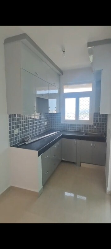 Kitchen in 2 BHK Apartment at Nilaya Greens, Raj Nagar Extension – for Sale