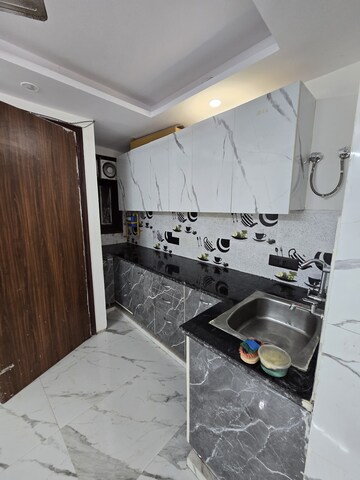 Kitchen in 1 BHK Apartment at Sector 23 Dwarka – for Sale