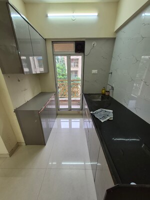 Kitchen in 2 BHK Apartment at Mohan Mahal, Panch Pakhadi – for Rent