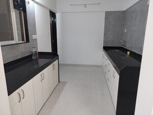 Kitchen in 3 BHK Apartment at GK Dwarka Heights, Pimple Saudagar – for Rent