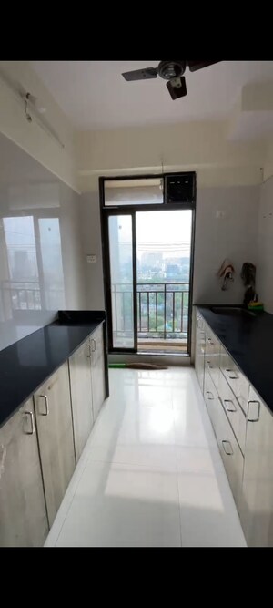 Kitchen in 2 BHK Apartment at Prithvi Pride, Mira Road – for Rent