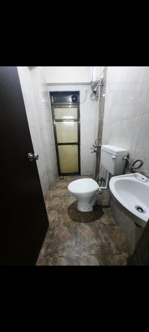 Bathroom in 2 BHK Apartment at Vihang Hills, Ghodbunder Road – for Rent