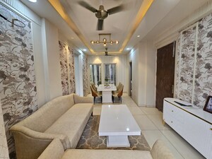 Living Room in 2 BHK Apartment at Artique Uptown Skylla, International Airport Road – for Rent