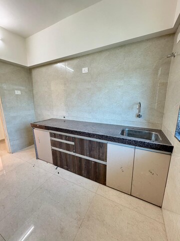 Kitchen in 2 BHK Apartment at Strawberry The Address, Mira Road East – for Sale