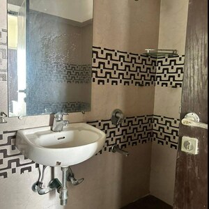 Bathroom in 1 BHK Apartment at Lashkaria Green Towers, Tepgaon – for Rent