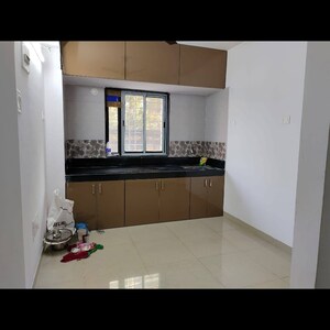 Kitchen in 1 BHK Apartment at Neelkamal CHS Goregaon West, Unnat Nagar – for Rent