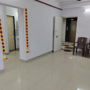 Living Room in 1 BHK Apartment at Neelkamal CHS Goregaon West, Unnat Nagar – for Rent