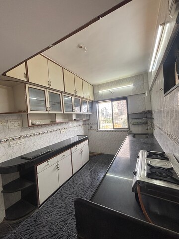 Kitchen in 2 BHK Apartment at Rose Apartment Juhu, Juhu – for Rent