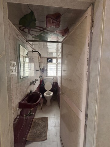Bathroom in 2 BHK Apartment at Rose Apartment Juhu, Juhu – for Rent