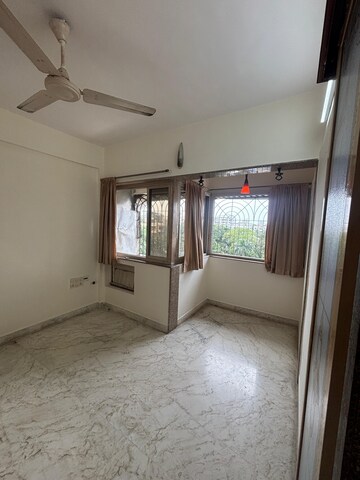 Room in 2 BHK Apartment at Rose Apartment Juhu, Juhu – for Rent