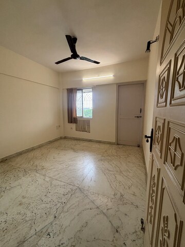 Room in 2 BHK Apartment at Rose Apartment Juhu, Juhu – for Rent