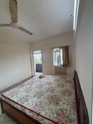 Bedroom in 2 BHK Apartment at Rose Apartment Juhu, Juhu – for Rent