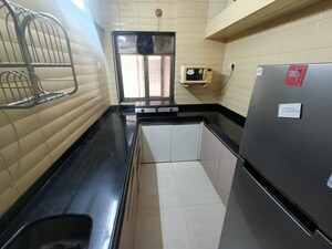 Kitchen in 2 BHK Apartment at Gundecha Greens, Kandivali East – for Rent