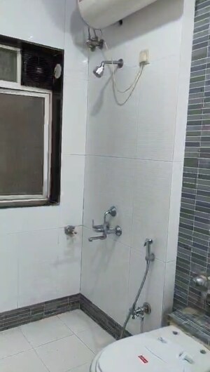 Bathroom in 2 BHK Apartment at Minal Apartments, Andheri East – for Sale
