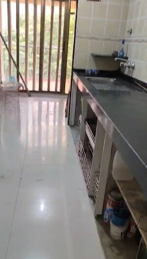 Kitchen in 2 BHK Apartment at Minal Apartments, Andheri East – for Sale