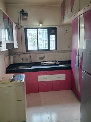 Kitchen in 1 BHK Apartment at Magarpatta City Heliconia, Hadapsar – for Rent