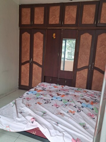 Bedroom in 1 BHK Apartment at Magarpatta City Heliconia, Hadapsar – for Rent