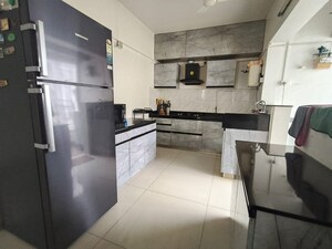 Kitchen in 2 BHK Apartment at Kolte Patil Langston, Kharadi – for Rent