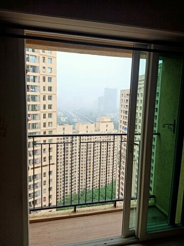 Room in 2 BHK Apartment at Rustomjee Azziano Wing D, Thane West – for Rent