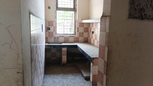 Kitchen in 1 BHK Apartment at Gulmohar Estate, Pi Greater Noida – for Sale