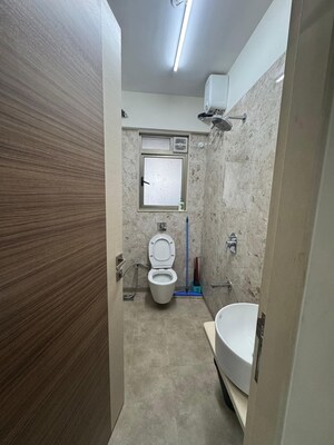 Bathroom in 2 BHK Apartment at Ruparel Ariana, Parel – for Rent
