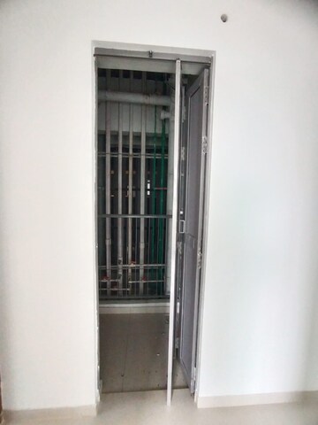 Staircase in 2 BHK Apartment at Kalpataru Immensa, Kolshet Road – for Rent