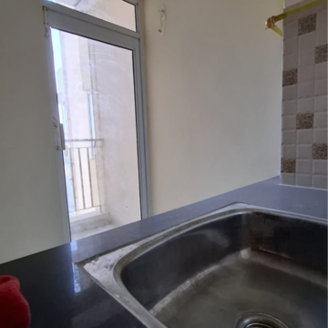 Kitchen in 2 BHK Apartment at Wave Dream Homes, Ram Nagar – for Rent