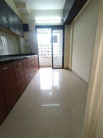 Kitchen in 2 BHK Apartment at Goyal Green Woods, Andheri East – for Rent