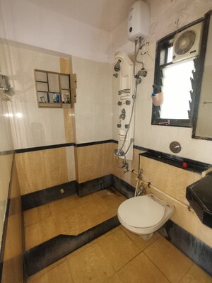 Bathroom in 2 BHK Apartment at Goyal Green Woods, Andheri East – for Rent