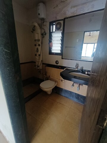 Bathroom in 2 BHK Apartment at Goyal Green Woods, Andheri East – for Rent