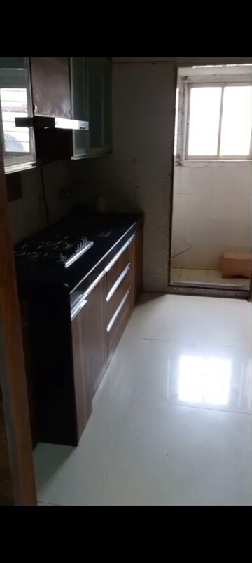 Kitchen in 3 BHK Apartment at Bindra Complex, Andheri East – for Rent