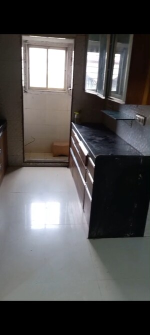 Kitchen in 3 BHK Apartment at Bindra Complex, Andheri East – for Rent