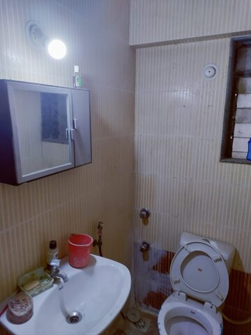Bathroom in 1 BHK Apartment at Vihang Valley Phase 3, Kasarvadavali – for Rent
