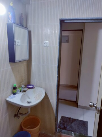 Bathroom in 1 BHK Apartment at Vihang Valley Phase 3, Kasarvadavali – for Rent