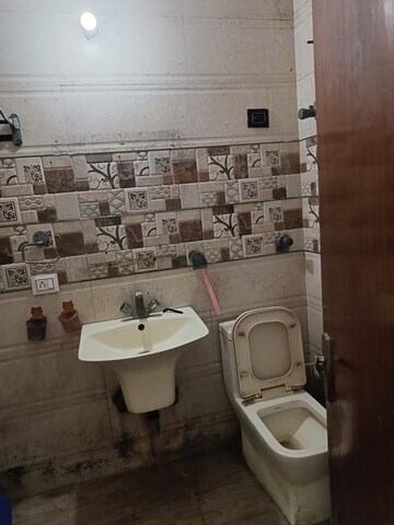 Bathroom in 2 BHK Apartment at Windsor and Nova Society, Ahinsa Khand 2 – for Rent