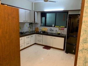 Kitchen in 3 BHK Apartment at Suyog Nagar, Senapati Bapat Road – for Rent