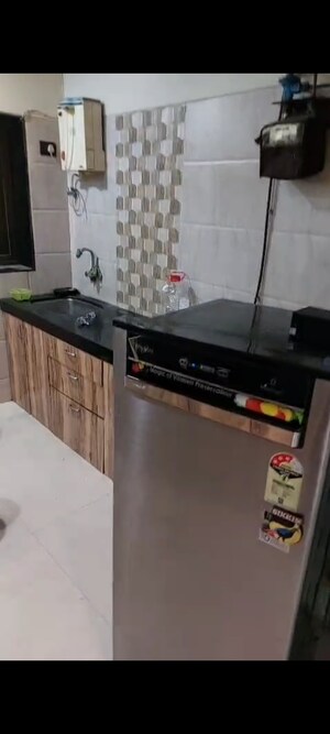 Kitchen in 2 BHK Apartment at Yashodham Complex, Goregaon East – for Rent