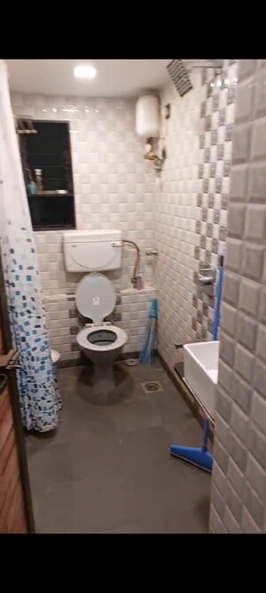 Bathroom in 2 BHK Apartment at Yashodham Complex, Goregaon East – for Rent