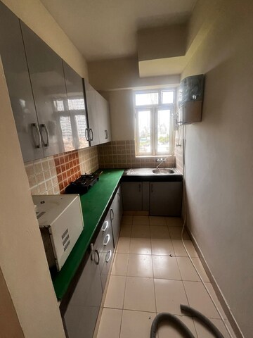 Kitchen in 1 RK Builder Floor at Ansal Sushant Lok I, Sector 43 – for Rent