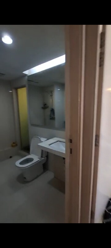 Bathroom in 2 BHK Apartment at Rodas Enclave Woodstock, Patlipada – for Rent