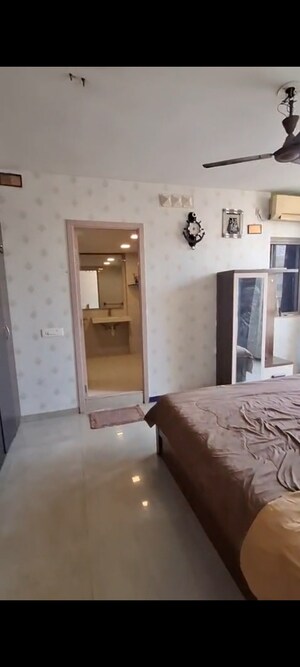 Living Room in 2 BHK Apartment at Rodas Enclave Woodstock, Patlipada – for Rent