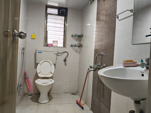 Bathroom in 2 BHK Apartment at Lokhandwala Whispering Palms, Kandivali East – for Rent