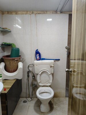Bathroom in 2 BHK Apartment at Lokhandwala Whispering Palms, Kandivali East – for Rent