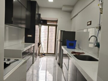 Kitchen in 2 BHK Apartment at Lokhandwala Whispering Palms, Kandivali East – for Rent