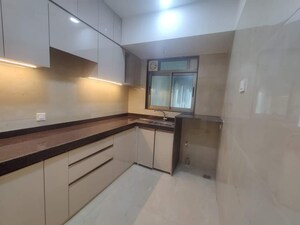 Kitchen in 2 BHK Apartment at Chandak Cornerstone, Worli – for Rent